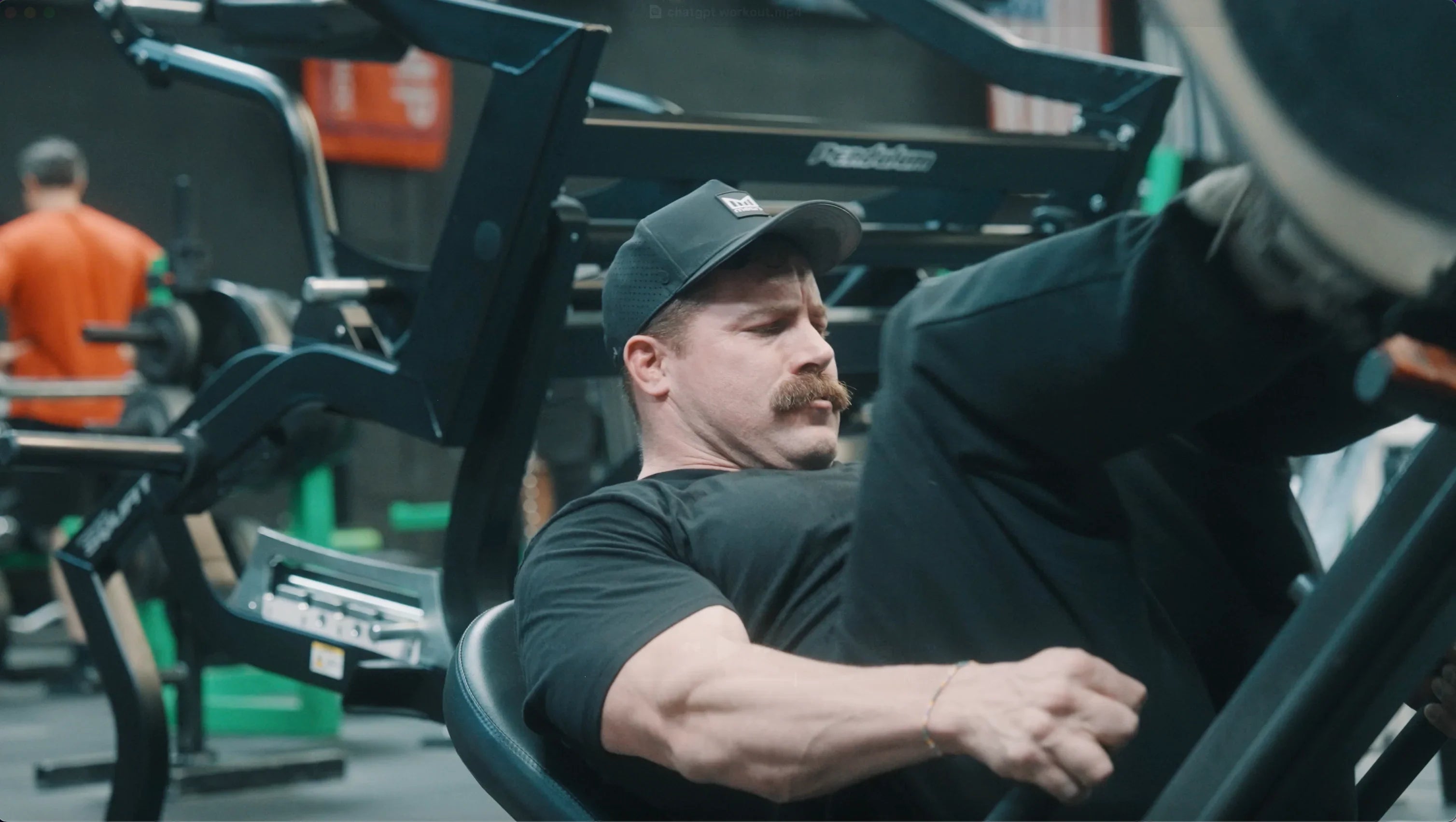 Lifter performing a heavy barbell back squat on leg day