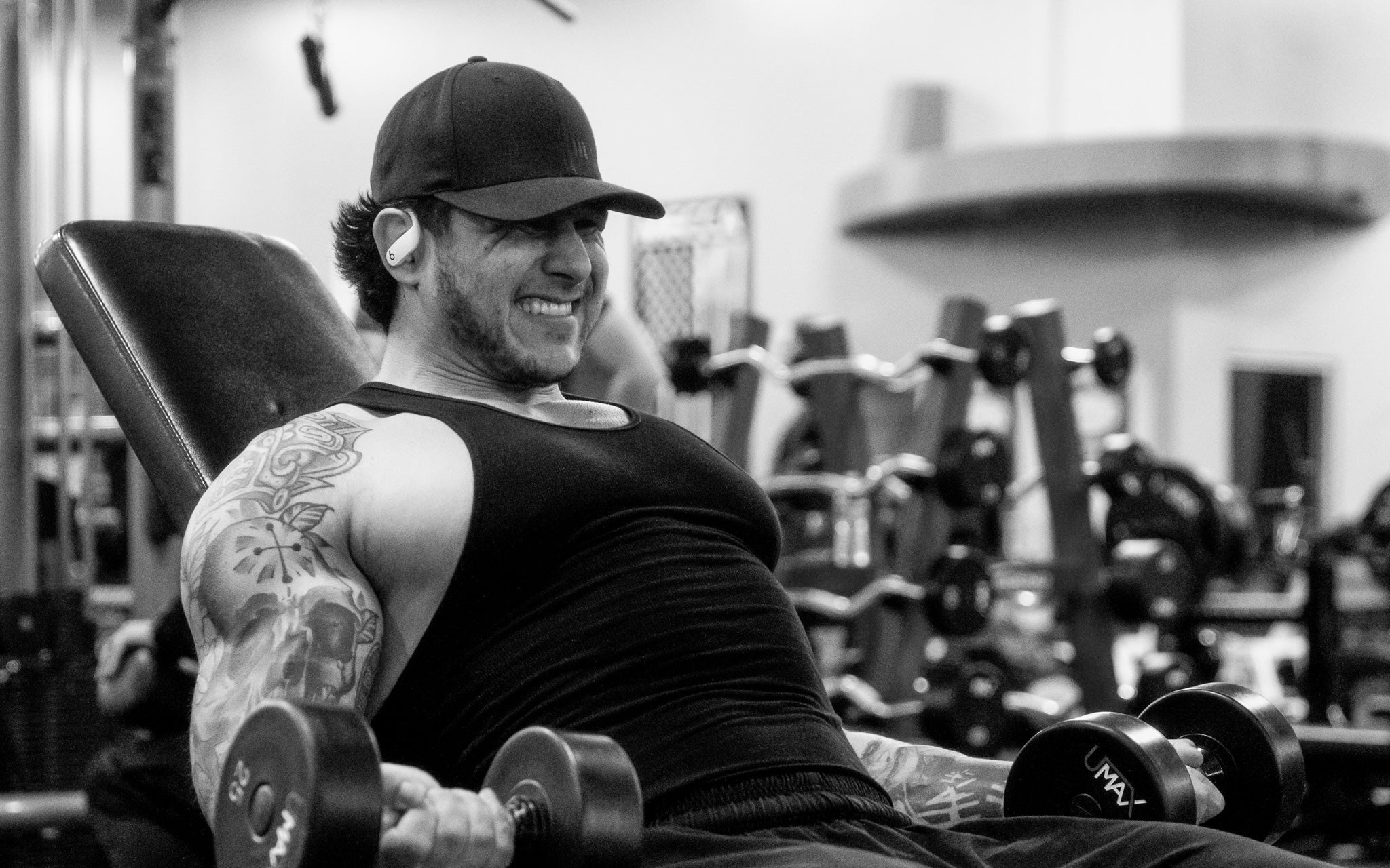 Athlete in the gym during a fat-loss cut — focused on strength training to protect muscle